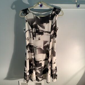 Luca A- line contemporary print dress
Size Medium